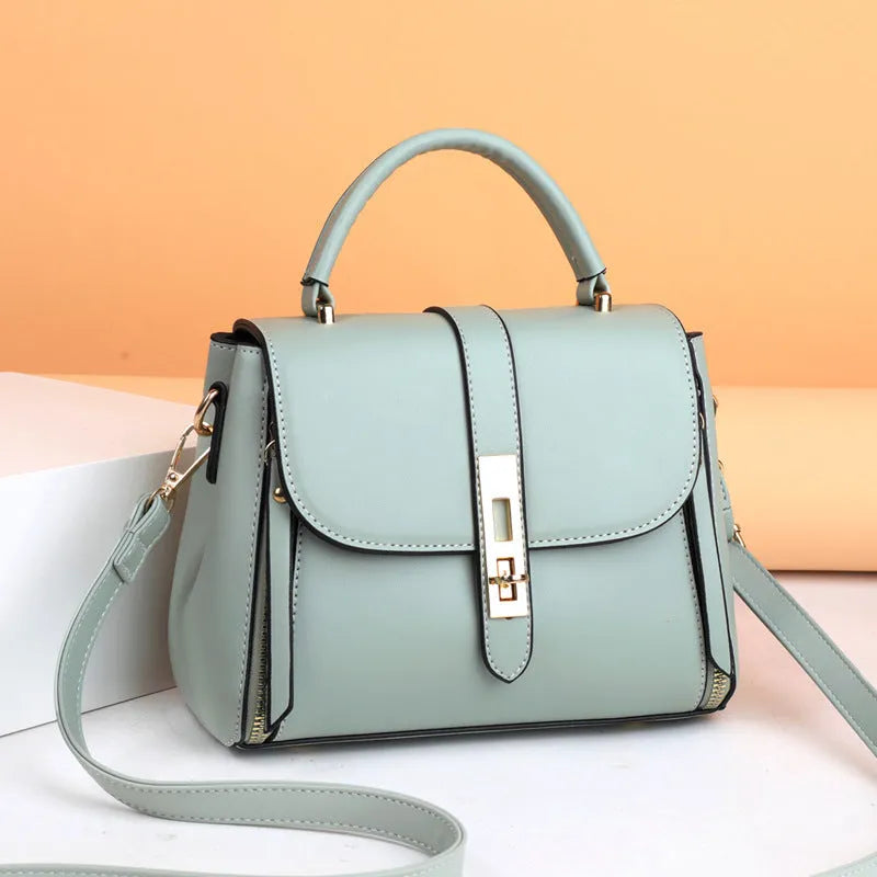 Soft PU leather women's messenger shoulder bag in square vertical shape, shown in one of four colours.