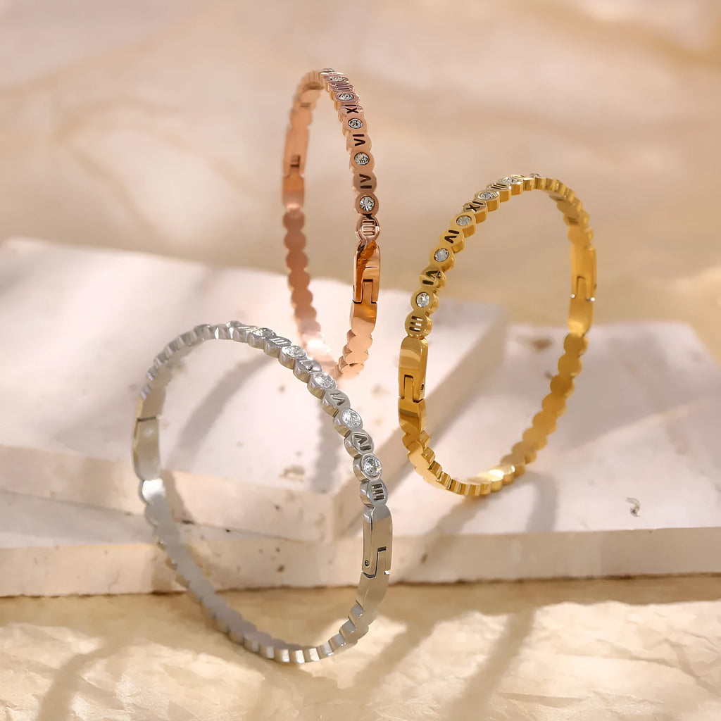 Korean style titanium steel bracelet with numeric elements in gold colour
