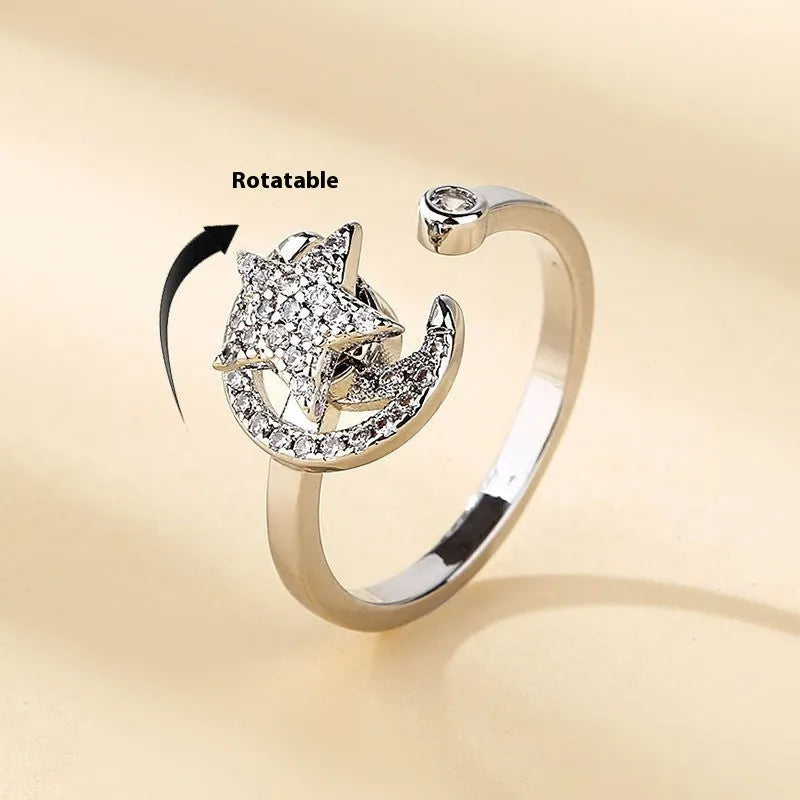 Gold copper micro-inlaid zircon star moon ring with adjustable opening on white background