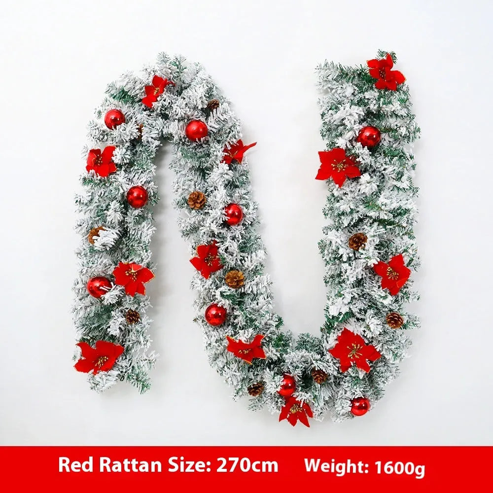 PVC Christmas rattan garland with flocking in golden colour, draped decoratively.