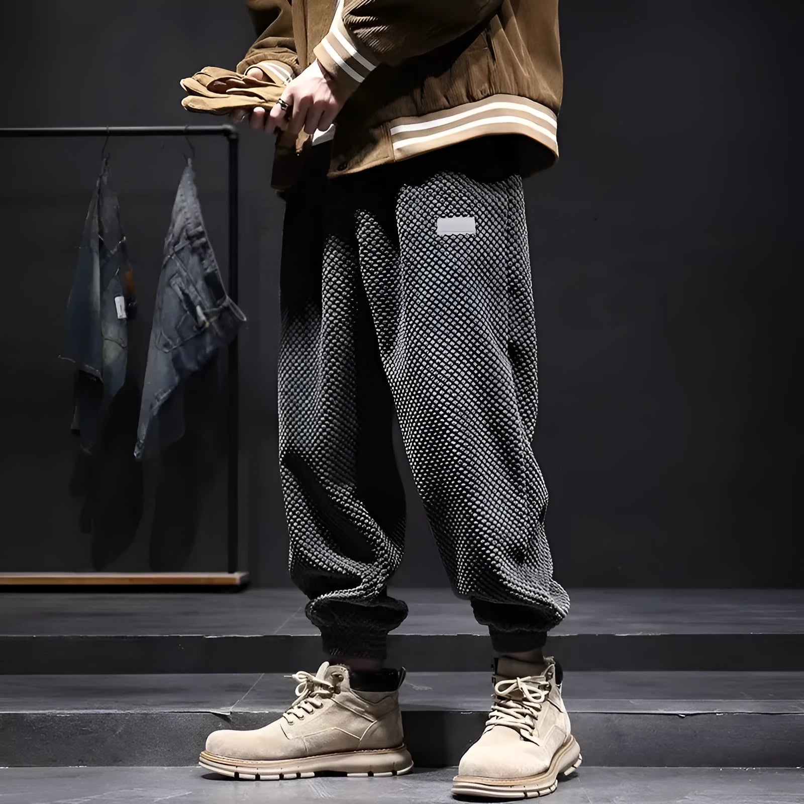Grey men's straight leg sweatpants with an ankle strap tie detail