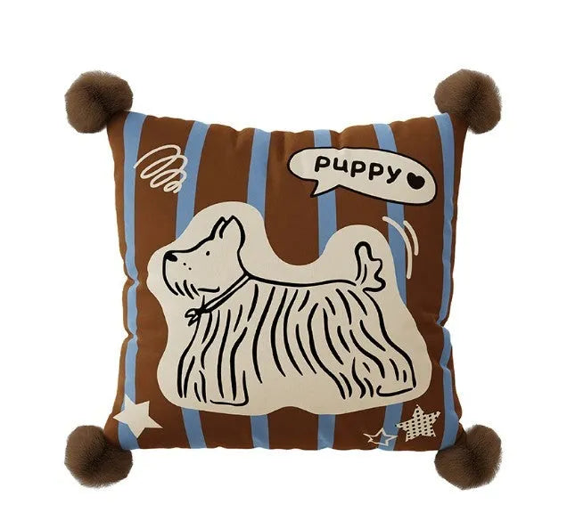 Blue cartoon animal print sofa cushion pillow on a grey sofa.