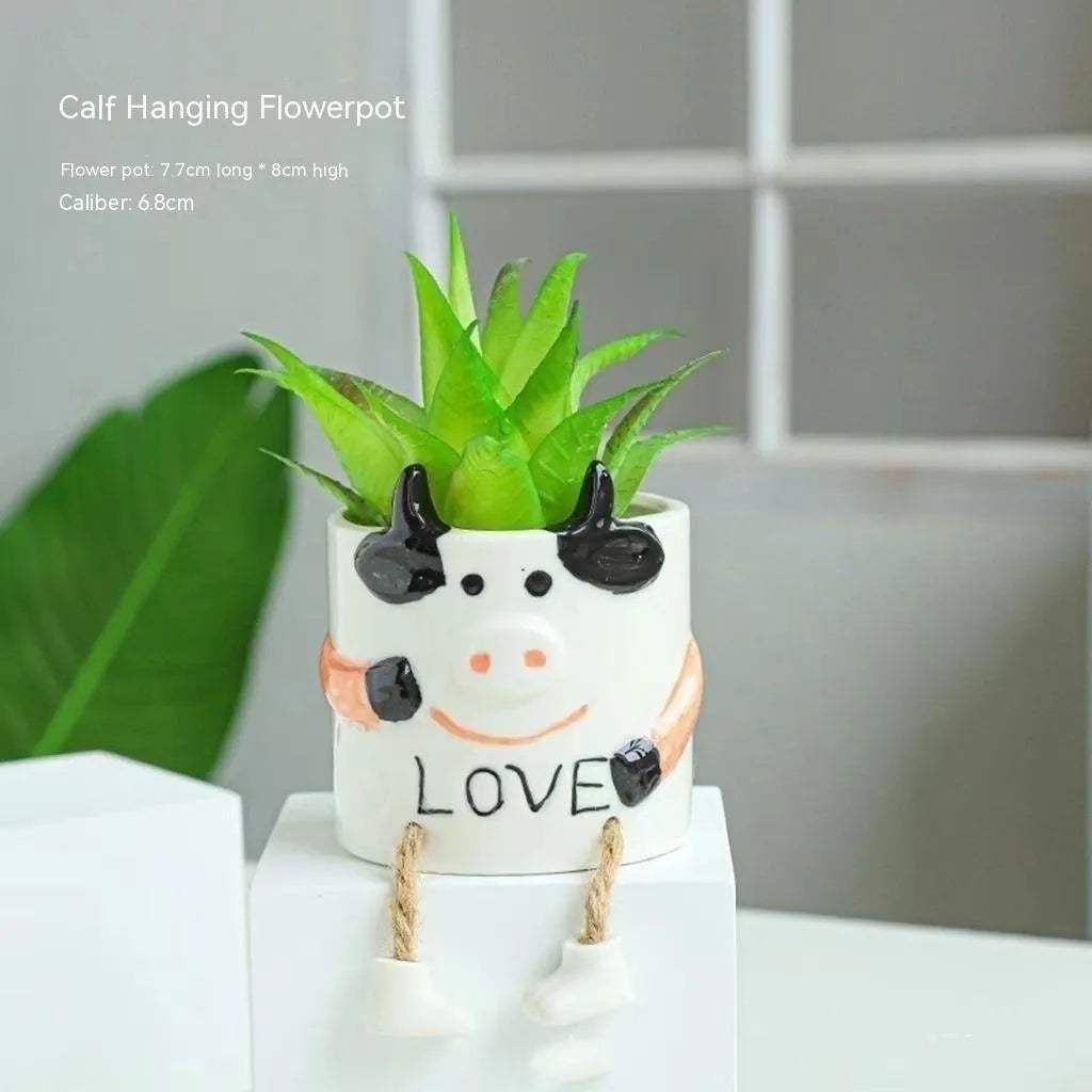Ceramic hanging foot flowerpot for succulent plants on desktop