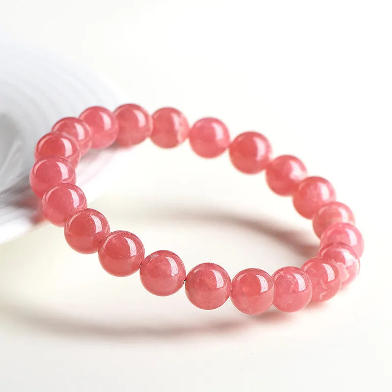 Crystal geometric bracelet with longevity lock detail in natural red stone pattern