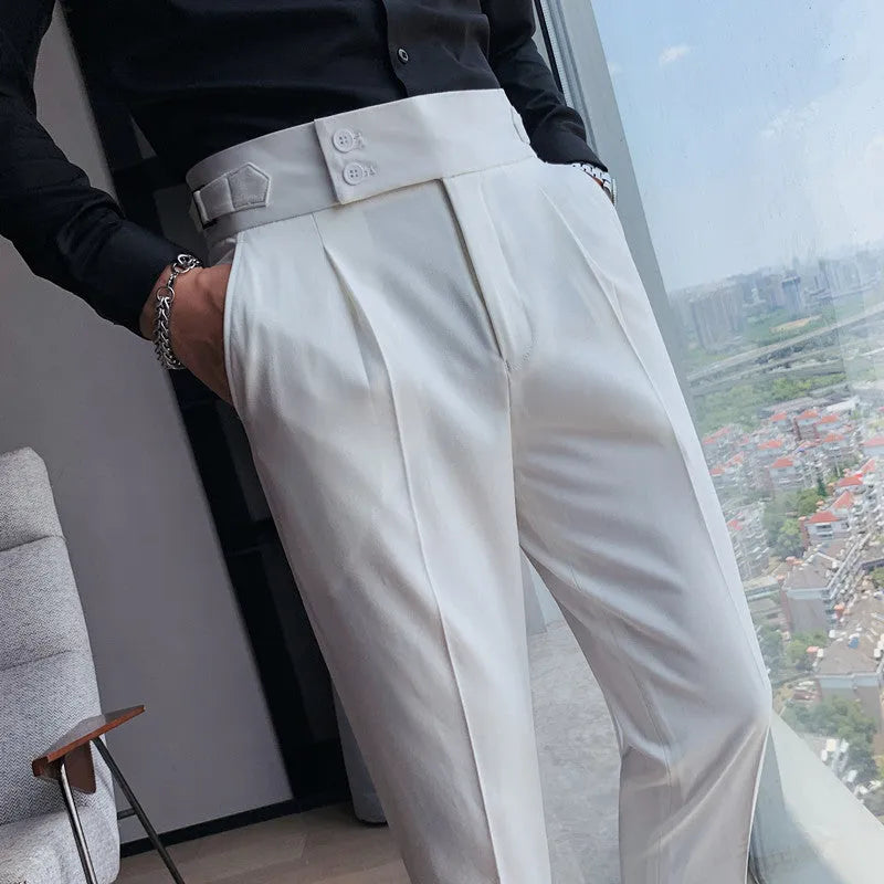 Straight-leg solid colour casual trousers in polyester on a size chart showing waist sizes 29 to 36.