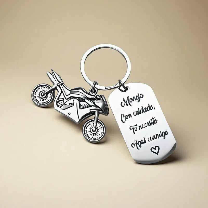 Stainless steel motorcycle key chain with inspirational design and included flannel storage bag