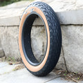 Brown rubber tyre for snowmobile and electric beach car showing 20×4.0 inch measurements