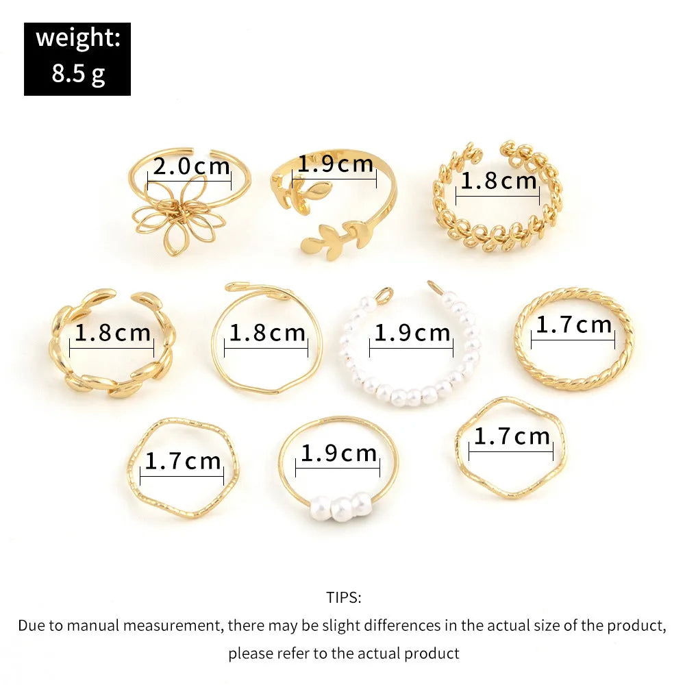 Gold openwork flower ring set showing floral design and glossy electroplated finish