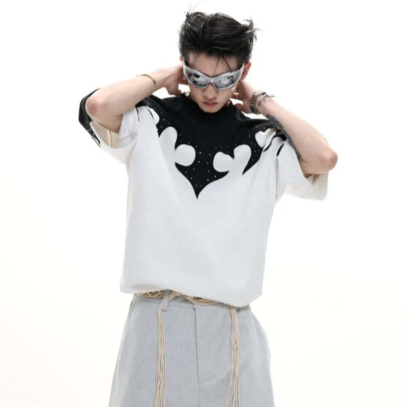 Men's red cotton t-shirt with burnt flower embroidery and rhinestone detailing on the front.