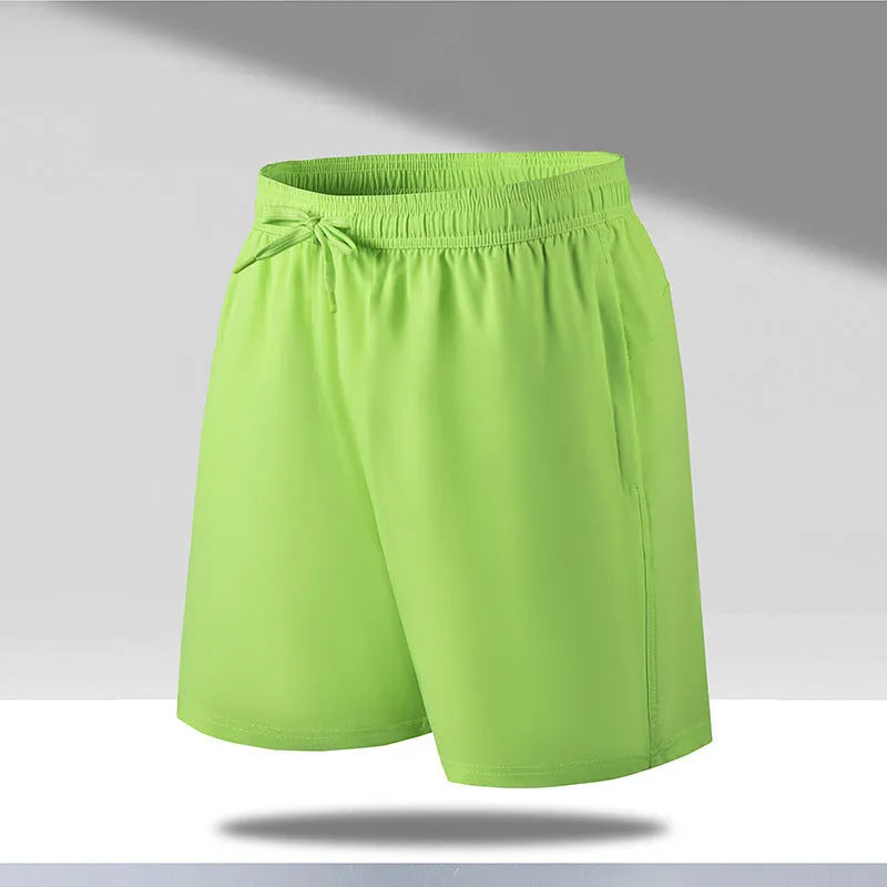 Men's loose fit quick-drying sports shorts in polyester fabric for summer activities