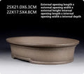 Handmade purple sand clay bonsai pot with antique oval design measuring 25x21x6.3cm