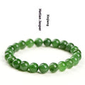 Polished natural Jasper Hetian jade bead bracelet on wrist, showing bead detail.