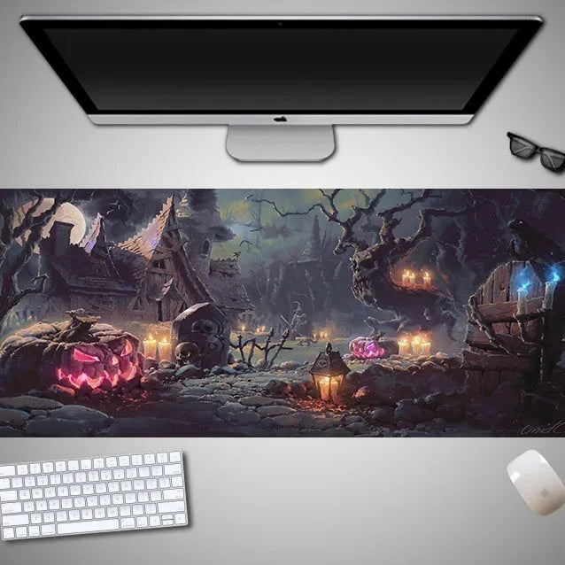 Large Halloween-themed computer mouse pad with graphic design on a desk