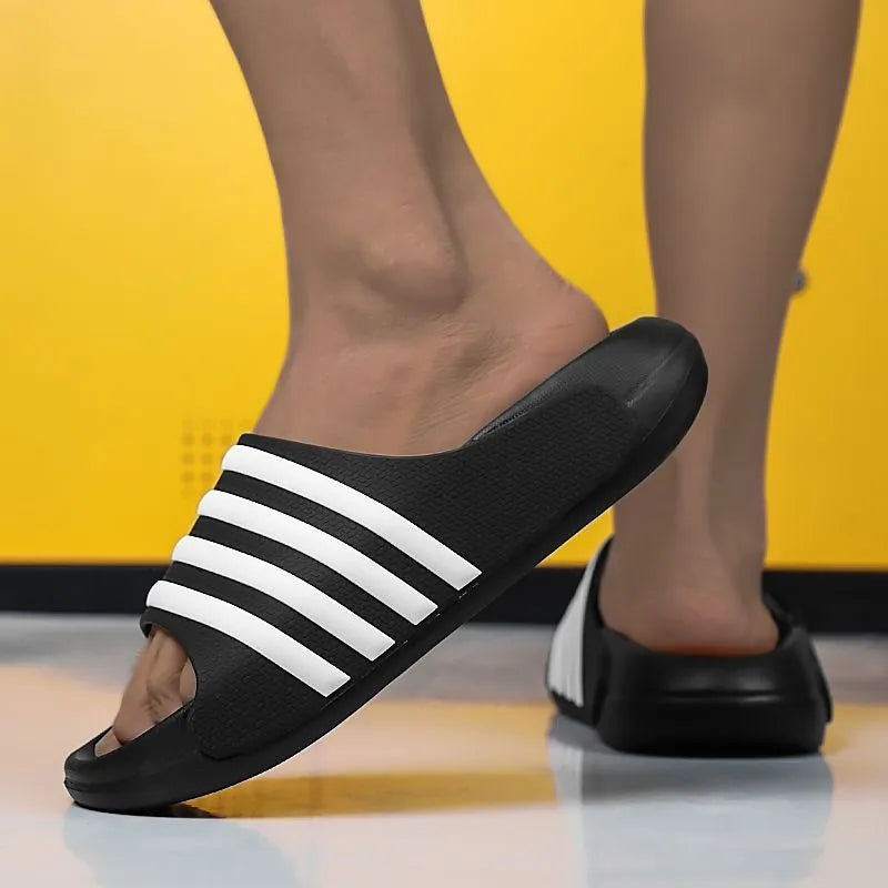 Men's casual slippers with a PVC upper and EVA sole in a two-tone colour option on a plain background.