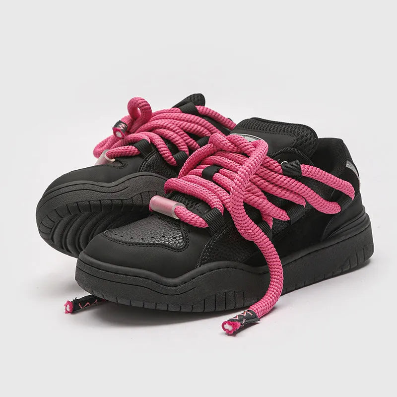 Low-top unisex casual shoes in denim blue with white rubber sole and lace-up front.