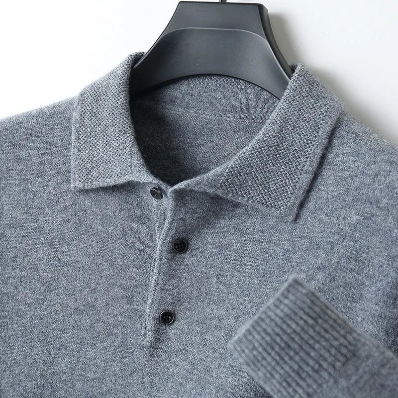 Men's grey wool pullover sweater with a polo collar and long sleeves, showing textured collage stitching.