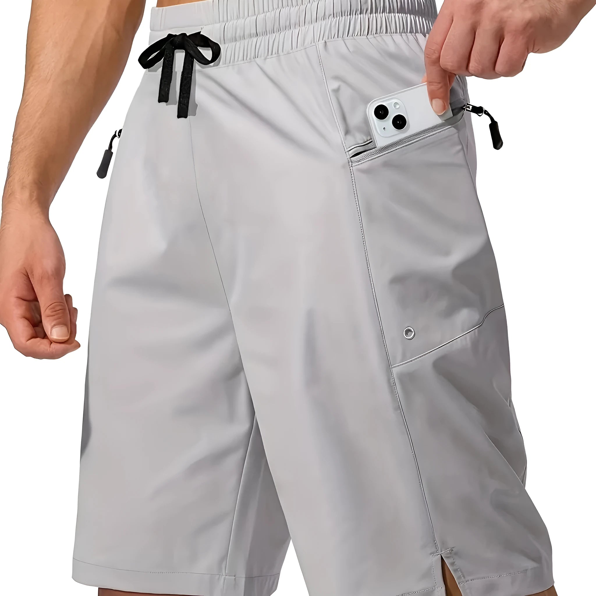 Man wearing solid colour quick-drying polyester beach shorts in a straight leg fit.