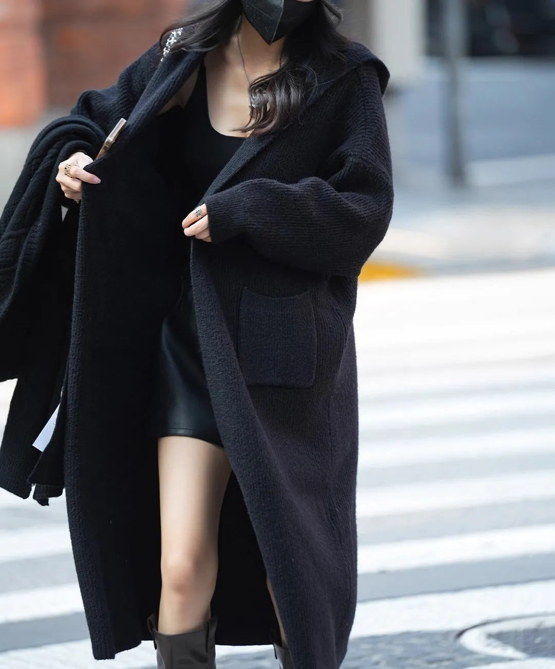 Long grey knitted cardigan with hooded trench coat design and regular long sleeves