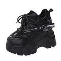 Women's white and black mesh platform sports shoes with cross-strap design and 6-8cm heel