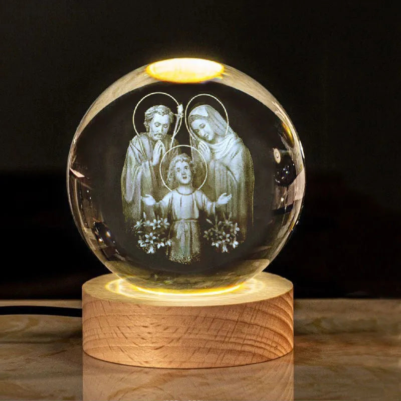 White crystal ball with cross and religious symbols on wooden LED base desk ornament