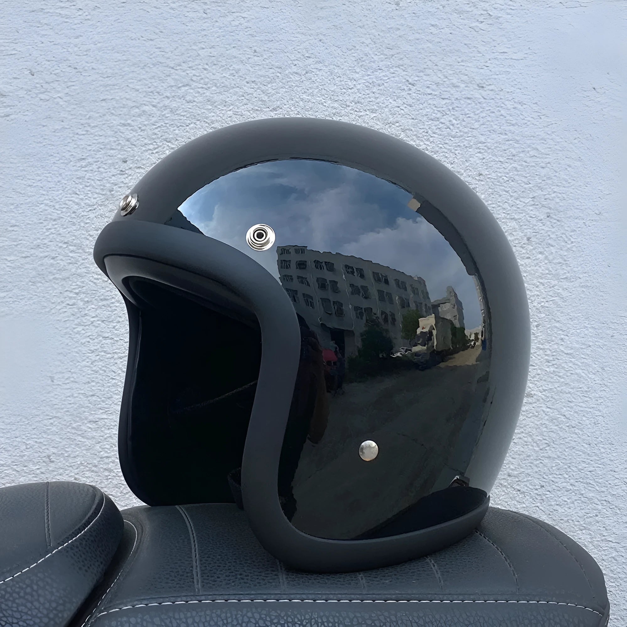 FRP retro half motorcycle helmet shown in cement grey colour for electric motorcycle commuting