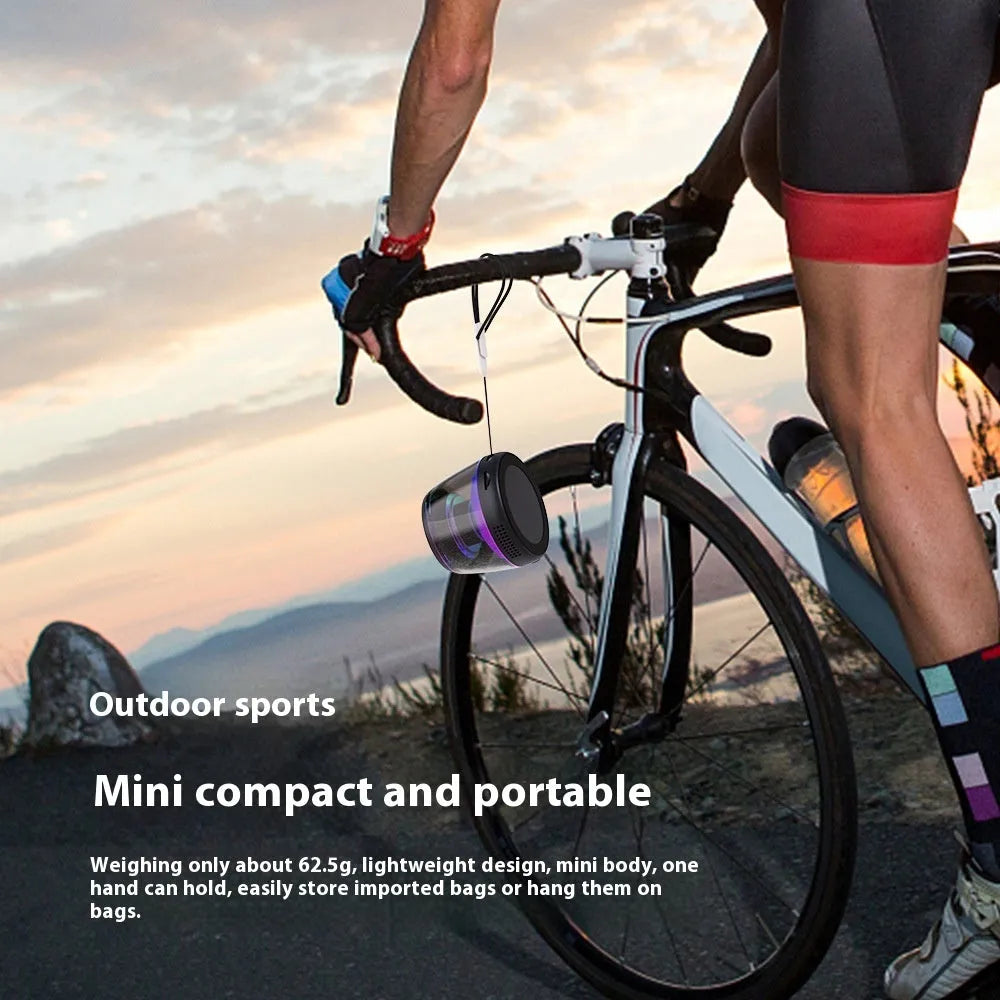 Compact portable wireless Bluetooth speaker with ambient lighting in black or white colour
