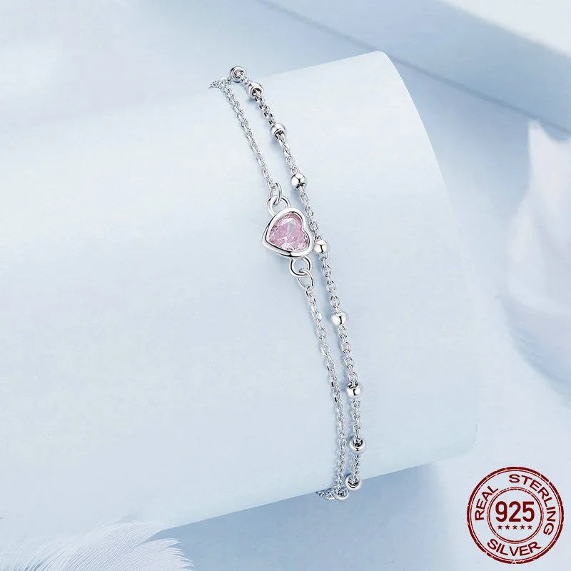 Sweet girlish heart-shaped sterling silver bracelet with a 6mm pendant on an adjustable chain