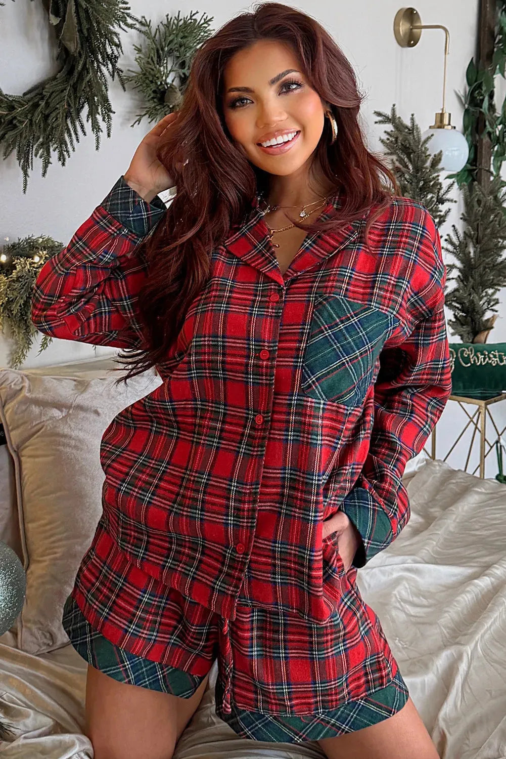 Red plaid Christmas holiday long sleeve shirt and shorts two-piece pajama set.