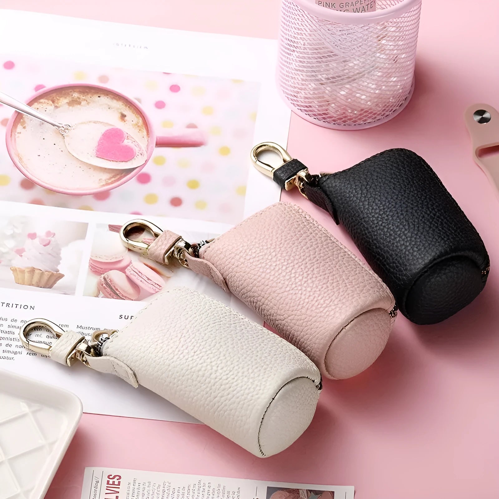 Men's black PU leather zipper key ring organiser case on a grey background.