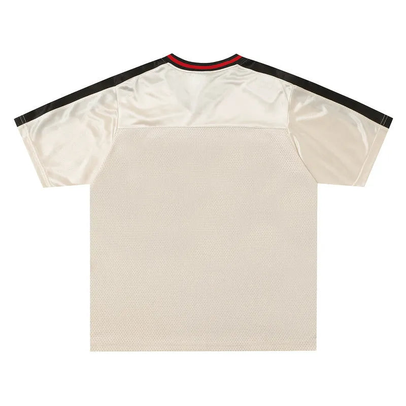 Apricot coloured loose-fit V-neck couple top with drop-shoulder sleeves and letter pattern