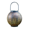 Solar-powered iron courtyard lamp with decorative hollow design and warm white LED lighting
