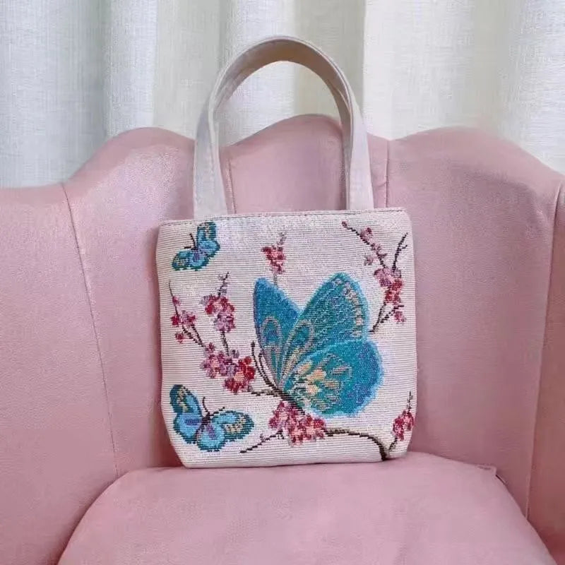 Double-sided gold wire embroidered canvas tote bag in small, medium, and large sizes with floral patterns.