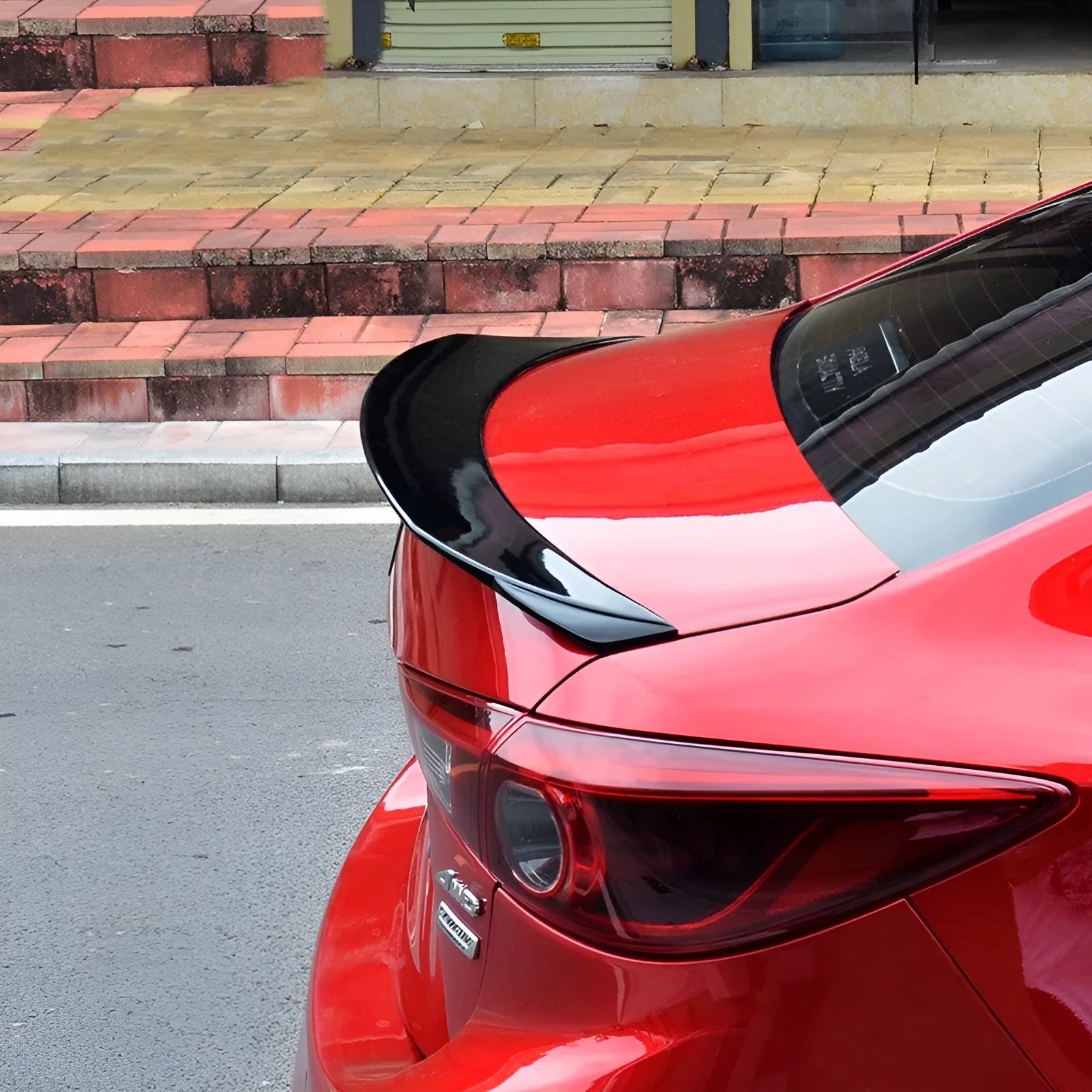 Mazda 3 Axela Exela tail trim spoiler in bright black finish for 2014-2021 model years
