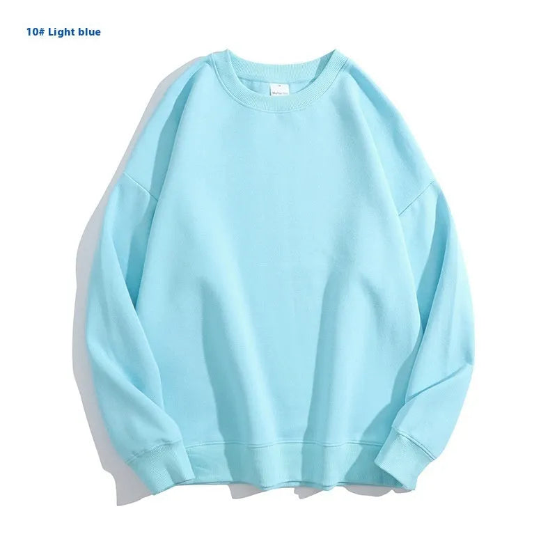 A loose-fitting, off shoulder, round neck cotton sweater in a solid colour with long sleeves.