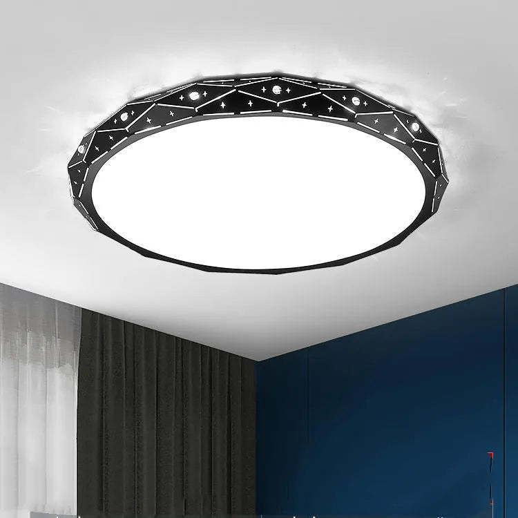Round black and white framed LED ceiling light fixture for room installation.