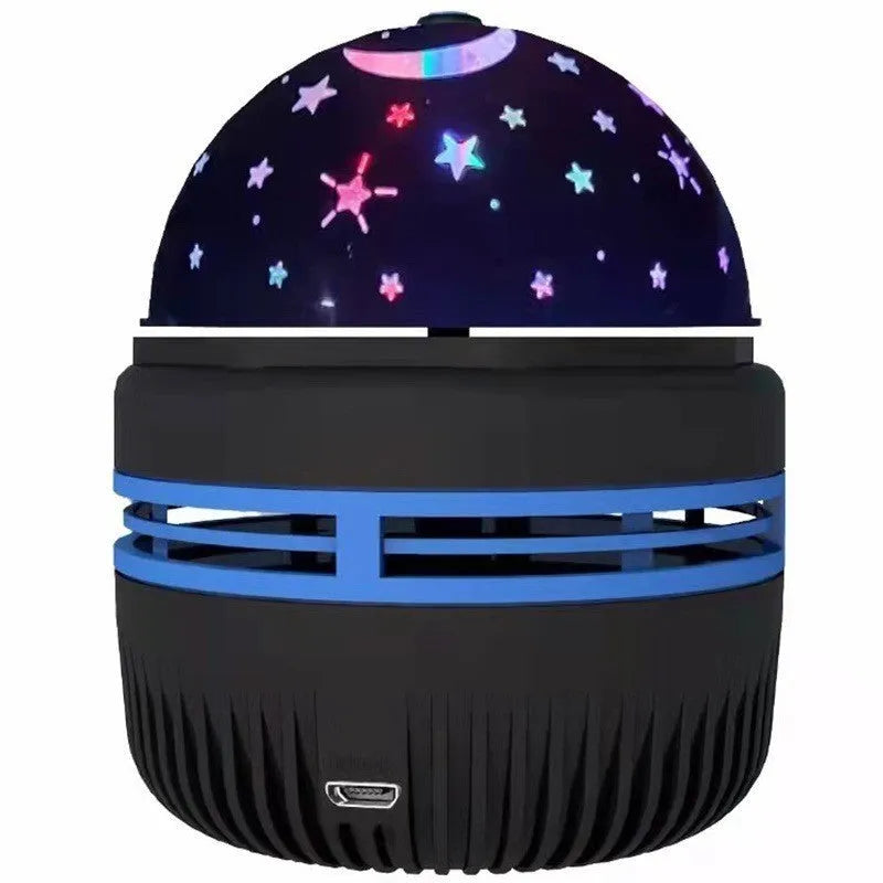 Compact USB-powered LED lamp projecting rotating colourful stars and galaxies onto a dark wall.