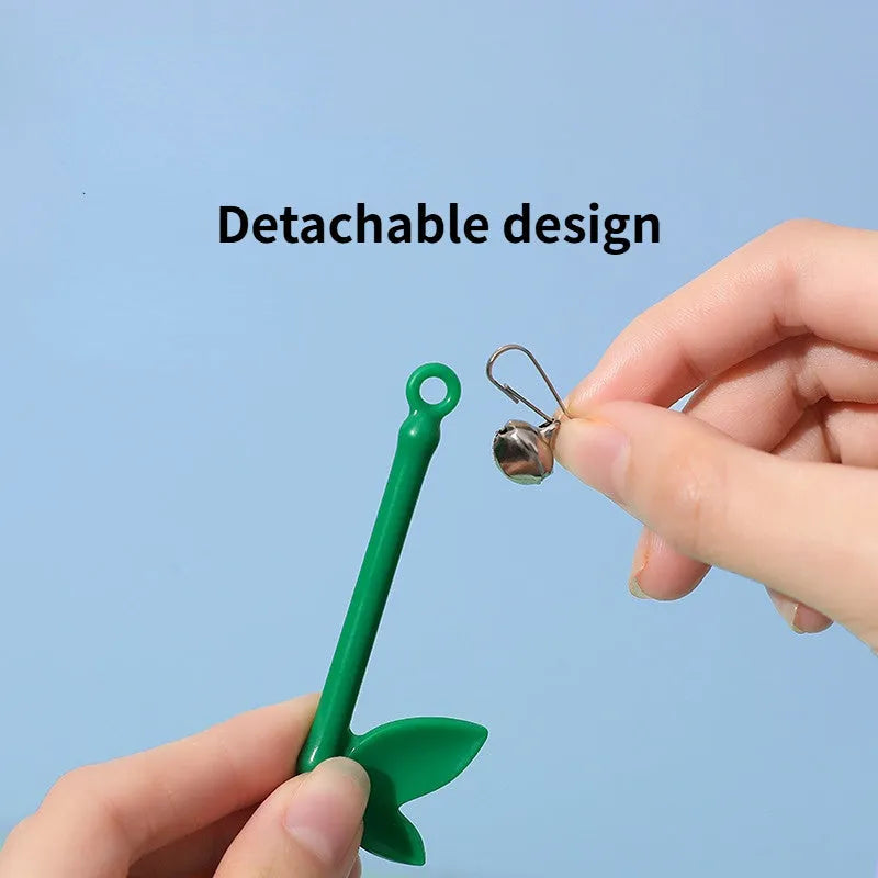 Green interactive cat feather wand toy with bells and synthetic feather attachments