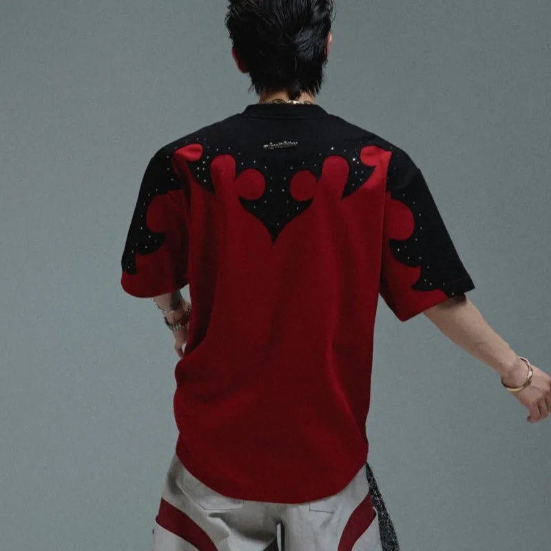 Men's red cotton t-shirt with burnt flower embroidery and rhinestone detailing on the front.