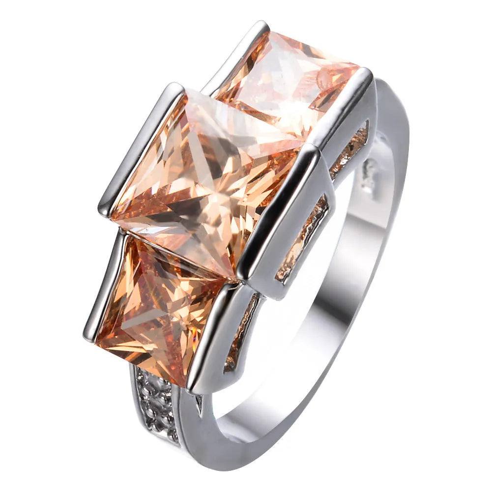 Copper electroplated geometric ring in multiple colours showing size range 6 to 10