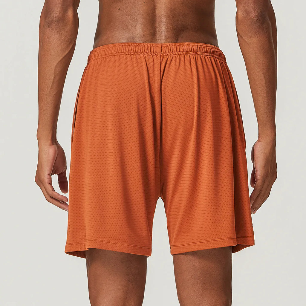 Men's quick-dry double-layer running shorts in various colours on a neutral background.