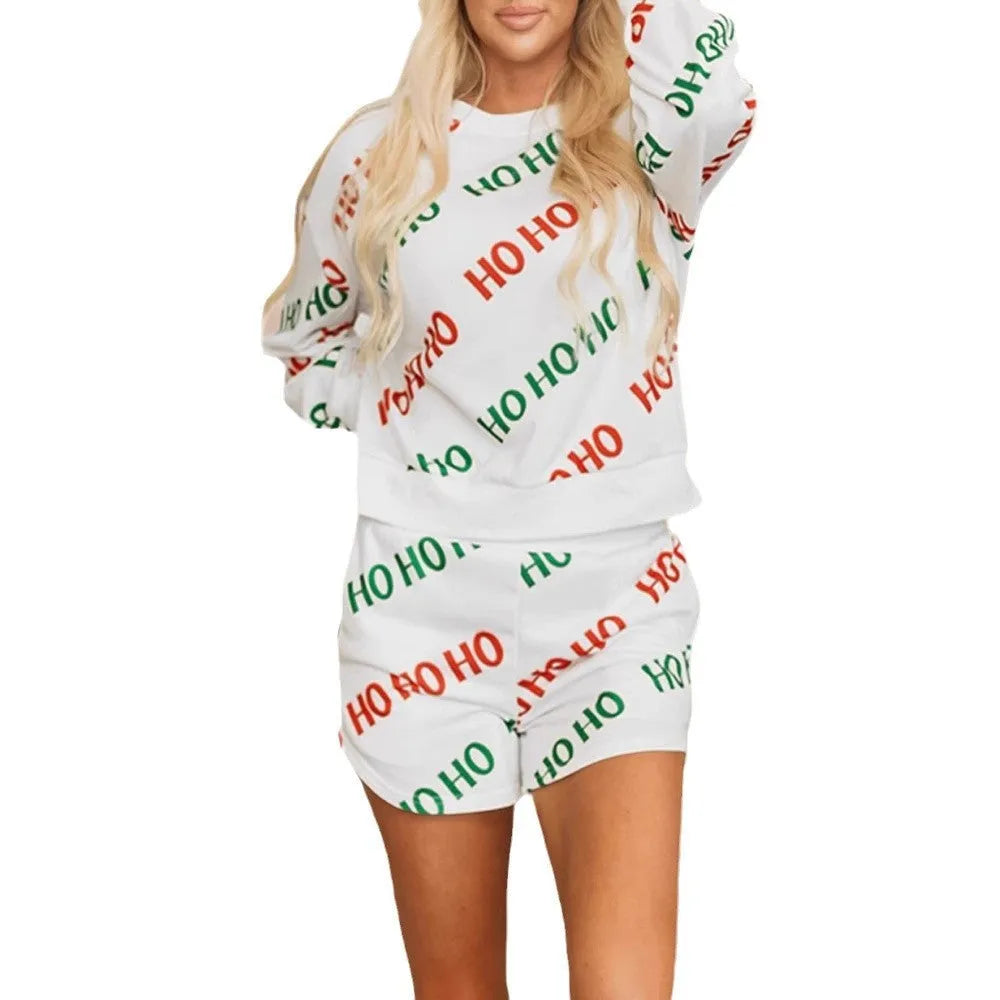 Women's white polyester two-piece suit set with letters printed design showing long sleeves and street fashion styling