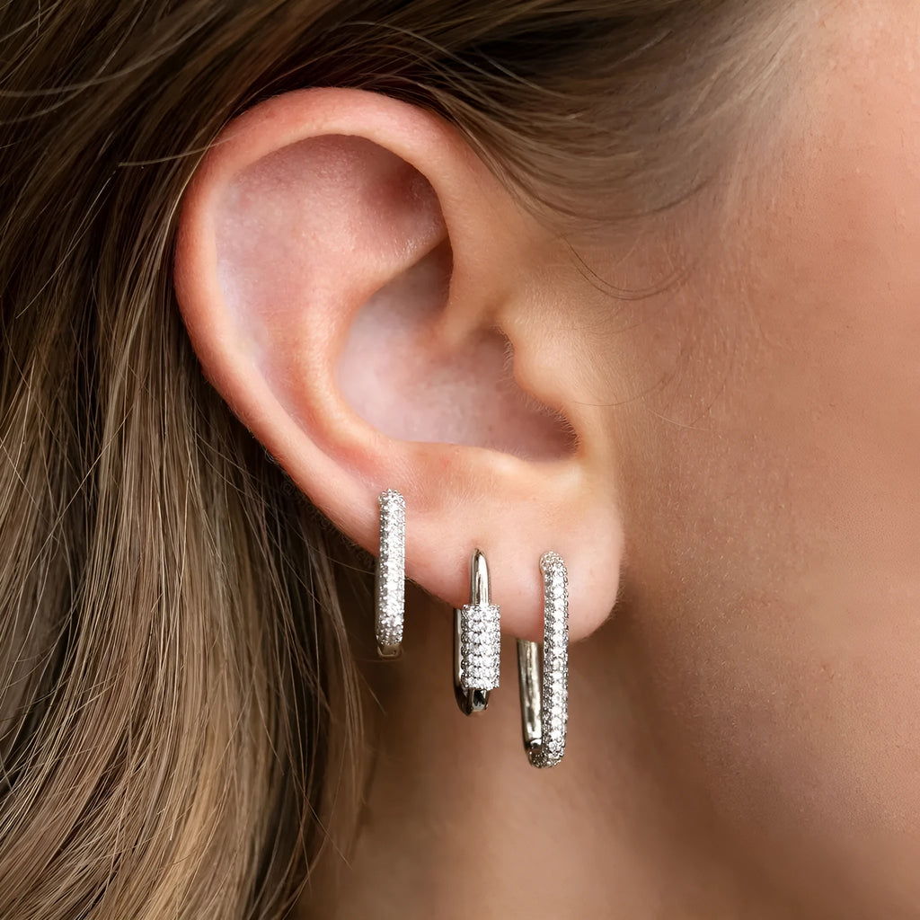 Three geometric copper ear clips with micro inlaid zircon treatment in gold and white colours