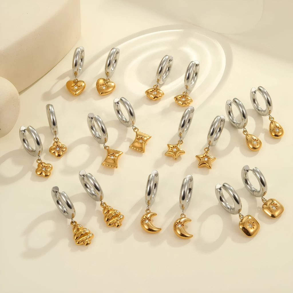 Gold Christmas tree earrings with heart and star shapes made from stainless steel with 18K plating