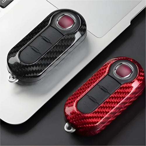Carbon fibre and glass fibre replacement shell for a car remote key fob.