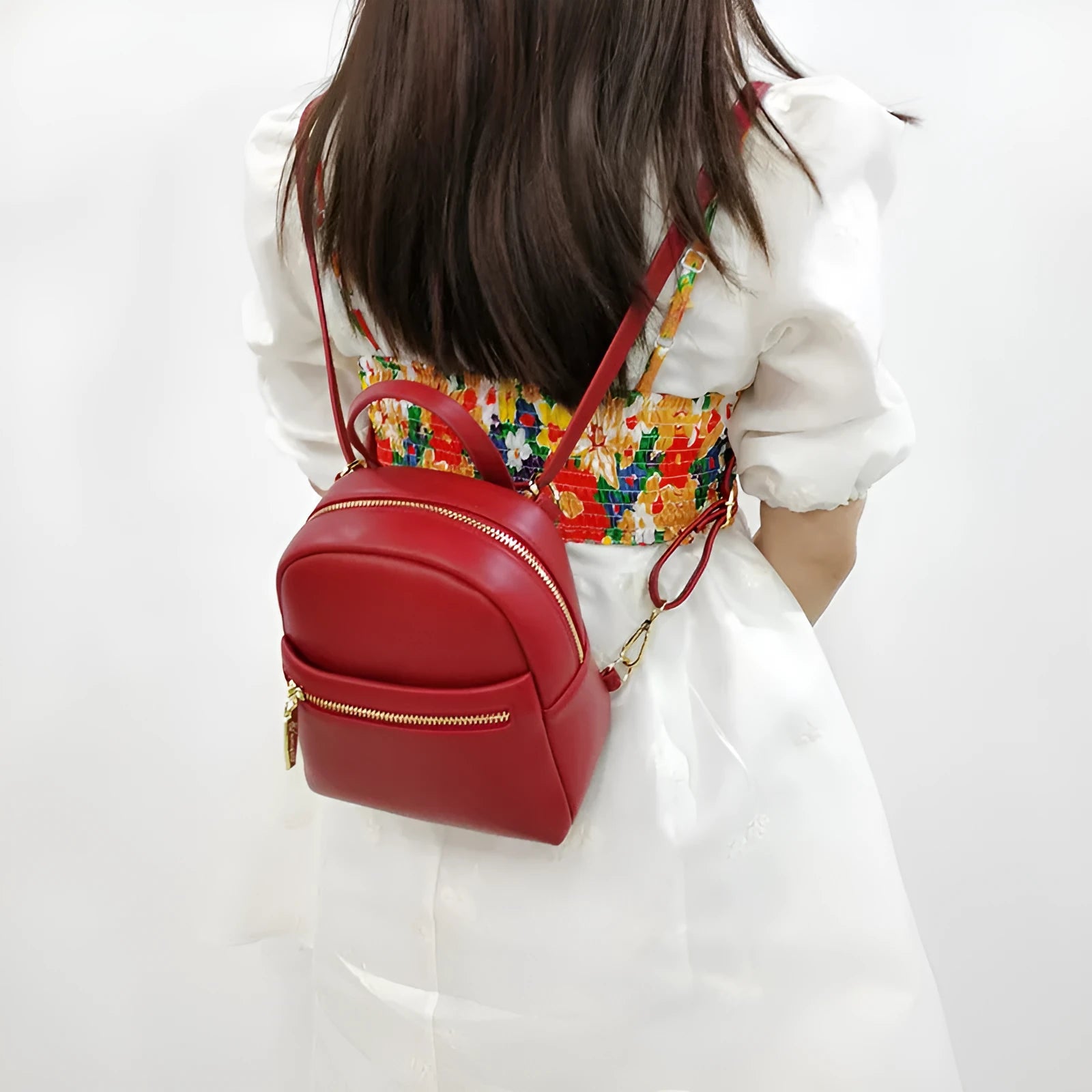 Soft PU mini backpack in street style with three-dimensional pocket and contrast trim