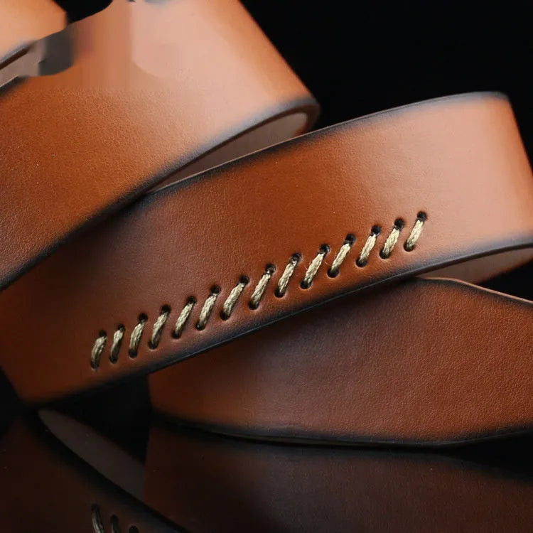 Men's brown retro pattern belt with a silver alloy pin buckle on a white background.