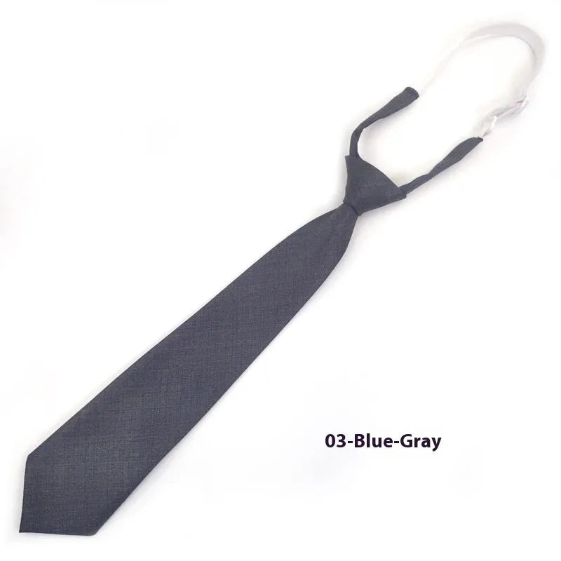 Men's solid colour cotton bow tie in arrow style, showing navy blue colour option.