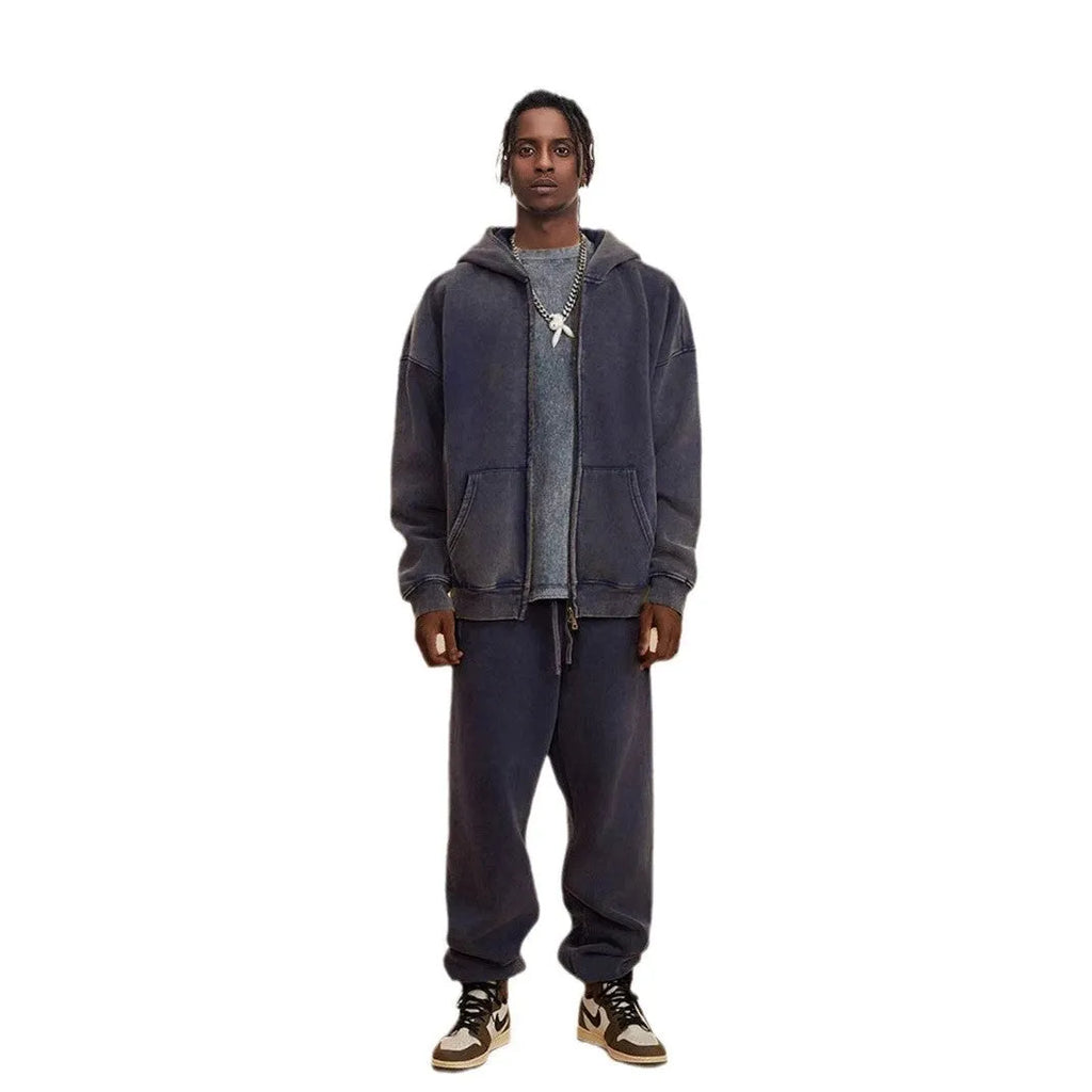 Men's vintage-style hooded cardigan sweater with a double zipper and fleece lining in a washed dark green colour.