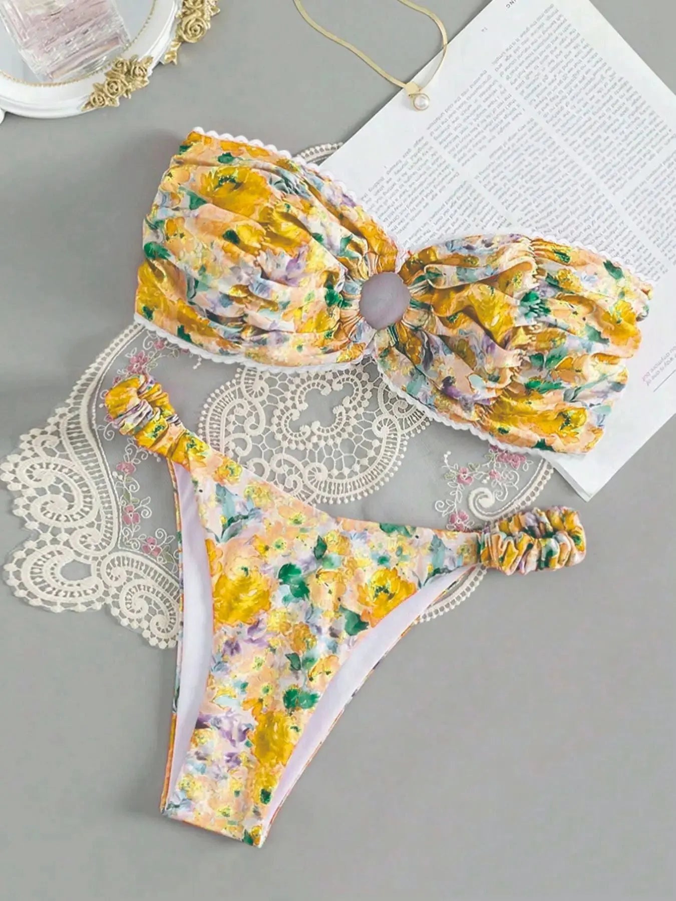 Women's floral printed bikini set with lace-up tube top and coordinating shorts for swimming