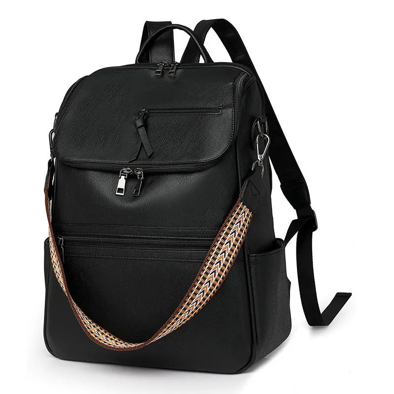Retro college backpack in black PU leather with curved shoulder straps and stitching details